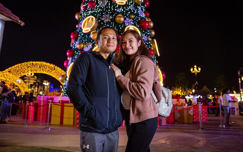  A couple get engaged under the giant festive tree at Global Village